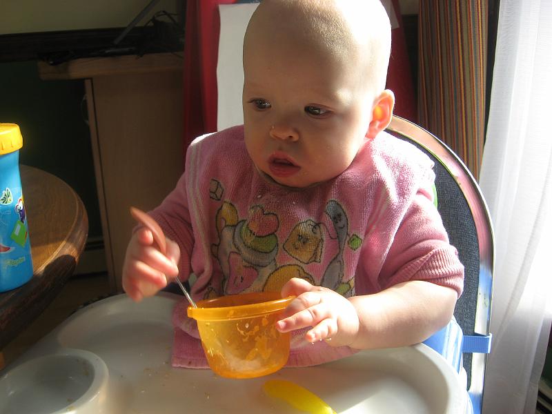 IMG_1189.JPG - Eve's first attempt at self feeding.
