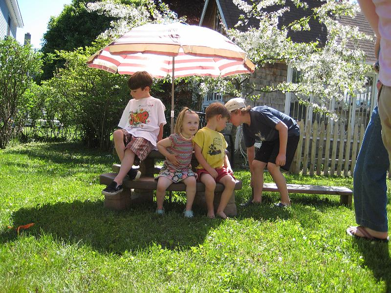 1010061749.JPG - The process begins to get a picture of all the kids together...