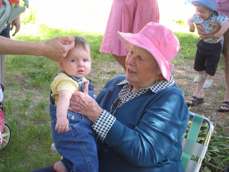 1010061809.JPG - Grandma takes a turn with baby Molly