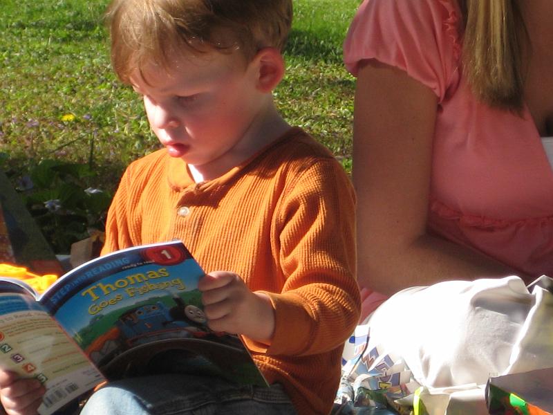 1010061863.JPG - The boy does like to read :)