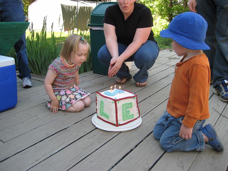 1010061812.JPG - Josie helps with the candles